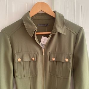 Suzy Shier army green polyester dress with gold button and belt accents.